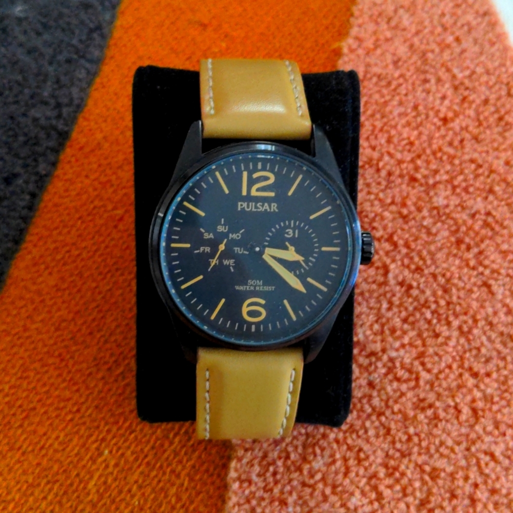 Pulsar Black and Tan large face watch